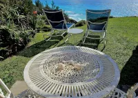 Sand Pebble 1 Bdrm Apt on Marley Beach w/ ocean views & steps to private beach - Wi-Fi