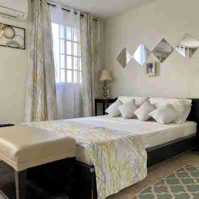 Unwind in Style at our Island Oasis! Rooms