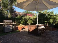 villa surrounded by greenery a few steps from the sea with terrace and garden - Homestays
