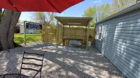 Neat,clean relaxed atmosphere located just outside of town . - Wifi