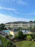Spacious Condo with Pool Near Beach- New Floors and Furniture! - balcony