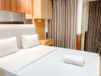 Wooden Touch Studio at Tamansari Skylounge Makassar Apartment By Travelio - Apartments