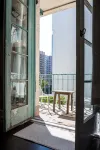 Chic Condo w Parking, AC and Steps to Beach and Convention Center