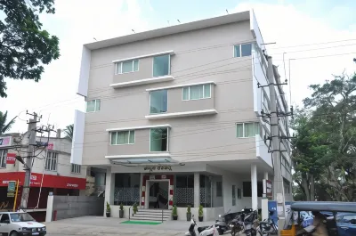 Palguni Residency Hotels near Prakash Enterprises
