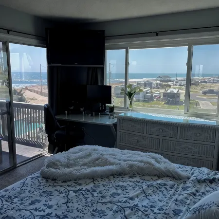 Expansive Ocean View: Private Balcony, Pool, Elevator & Executive Office