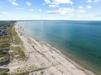 Charming Seaside Cottage  Sleeps 9 with WiFi, AC, 2 Min Walk to a Private Beach