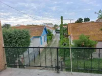 Apartment with balcony upstairs of a villa 300 m from the sea