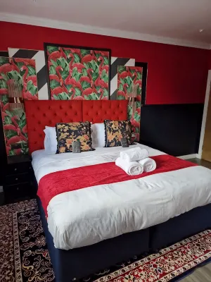 The MAD Hatter's Guestrooms
