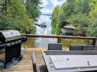 Lakefront Private Cove Retreat w/ Sandy Beach, Dock, Hot Tub + Boat & Ski Option