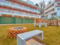 Ooty Blossom Retreat by Voye Homes Hotels in Udagamandalam