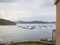 아파르타멘토스 투리스티코스 플라야 데 오스모 - 홈스테이