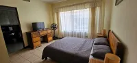 Apartotel Obelisco San José Aeropuerto - アパートメント