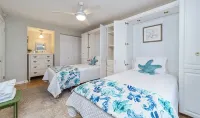Southern C's Beachfront condo, tropical heated pool, great for family or couple - Boutique
