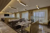 Grand Continent Hosur A Sarovar Portico Affiliate Hotel - 朝食