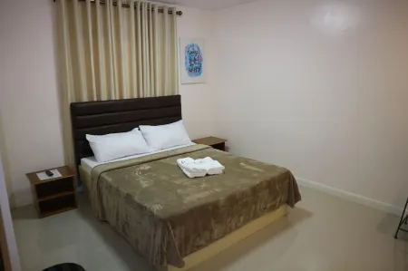 La Trinidad Pension House Отели рядом с достопримечательностью «Sampaguita Gardens»