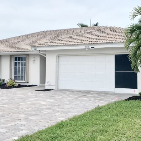STUNNING!! LUXURY WATERFRONT HOME - HEATED POOL- Close to Harbor/Fish Village