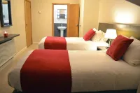 Carrick Plaza Suites and Apartments - Bãi đậu xe