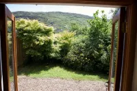 Rusheens Cottage. Charming comfortable cottage with sauna in peaceful valley.