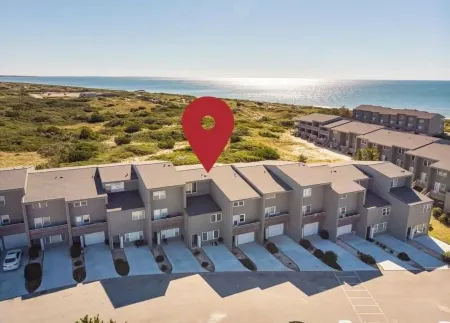 Polished condo with ocean views spanning Fort Macon & Cape Lookout Lighthouse!