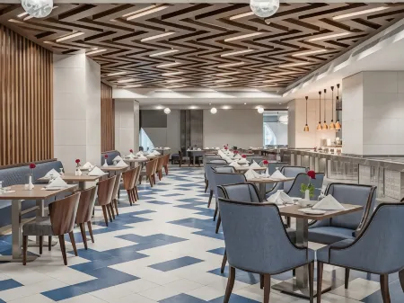 Wirgan Hotel Al Azizyah Отели рядом с достопримечательностью «King Abdullah Library»