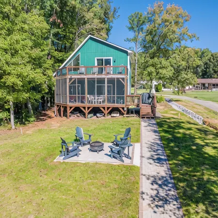 Beautiful lake front cottage, deep water lot with covered dock and amenities.