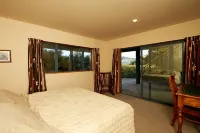 Akaroa Holiday Home.  Spacious, sunny, harbour views and close to town. Sleeps 8