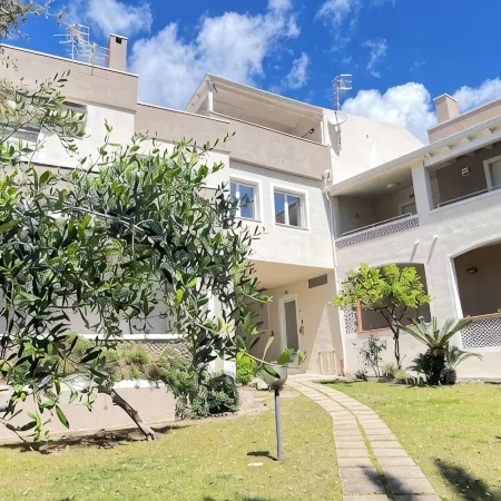 Villasimius: La Chiocciola apartment Surrounded by greenery.