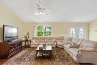 Fenced, private, family friendly villa with exotic poolside views near airport. - Wifi