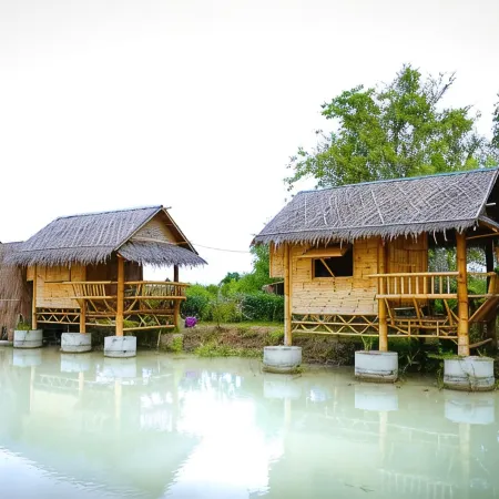 Rice Wonder Cafe & Eco Resort Отели рядом с достопримечательностью «Ват Саранат Тхаммарам»