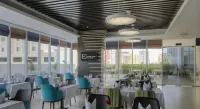Premier Hotel - Desayuno