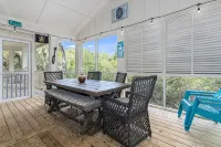 "The Palms" is nestled on a secluded half acre in the forest.  ThePalmsHouse.com - Wifi