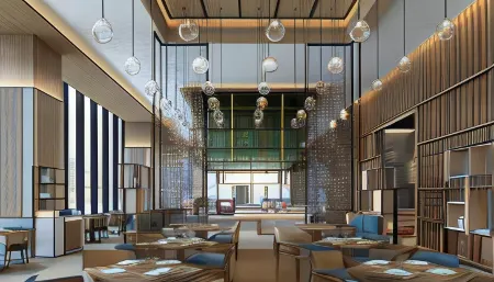 Hualuxe Yibin Hotel  by lHG Отели рядом с достопримечательностью «Li Zhuang Lv You»