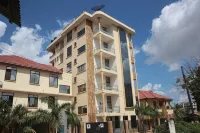 Hotel de Mag (Plaza) Hoteles en Dar es-Salam