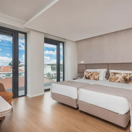 Essence Inn Marianos Hotel