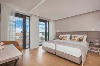 Essence Inn Marianos Hotel