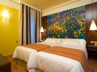 Suites Gran Vía 44 Hotels near Bib-Rambla Square