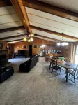 Quiet cabin in the woods w/ access to pools, river, & lakes in gated community!!