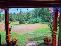 Cozy 2-bedroom cabin in welcoming Sangerville with WiFi - Homestays