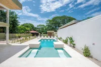 Gated + Lux +New Modern 4-BD Home in Playa Potrero – AC, WiFi & Steps to  Beach! - Villas