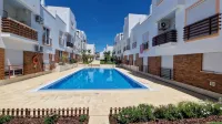 2 bedroom top floor apartment, swimming pool, Air-Con.