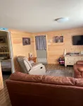 Cozy 2-bedroom cabin near endless trails. Family and pet friendly. Fire pit & AC