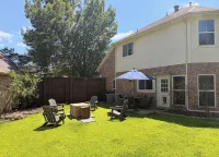 Home away from home with big private fenced backyard