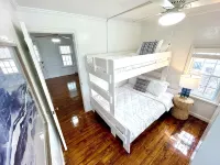 Charming Coastal Cape Cod w/ King Bed, Bikes, & Game Room near Downtown Beach - Wifi