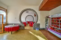 Binchuan Shanrong Inn - Posadas