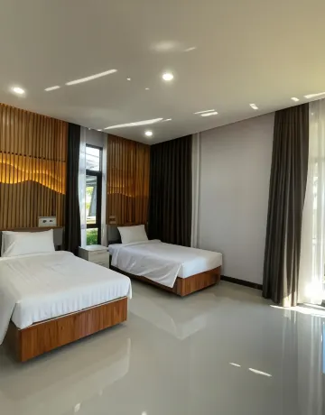 ห้องดีลักซ์เตียงแฝดพร้อมอ่างจากุซซี่