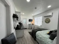 Modern studio apartment with covered outside seating area