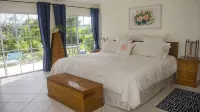 Spacious 4-Bedroom Villa, on a Lovely Waterway, with Beach and Ocean Views