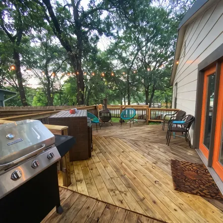Spacious Modern Lake Retreat w/ Deck! Only a short Walk to Swimming and Fishing!