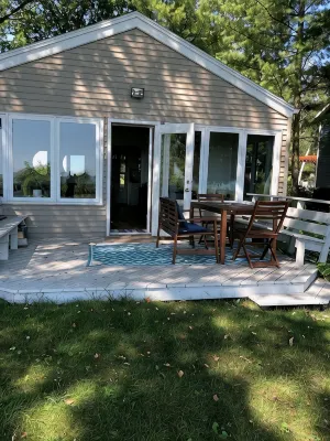 Bright and Cheerful Lake Front Beach Cottage