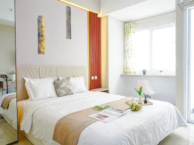 Wood Accent Studio at Royal Sentul Park Apartment By Travelio